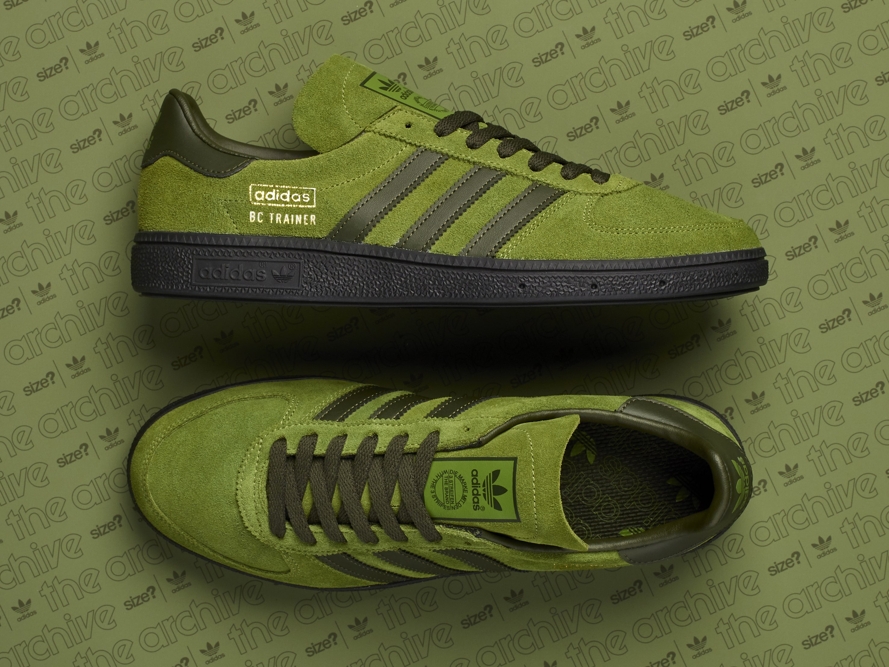 green stripe adidas trainers